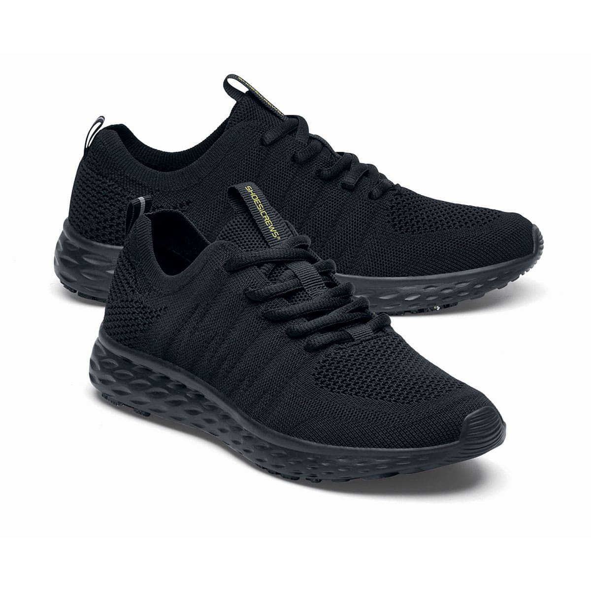 The Everlight™ Everlight Eco Women's Black from Shoes For Crews are lightweight and breathable slip-resistant trainers made from recycled materials, pair seen from the right side, emphasised on the tip of the right shoe.