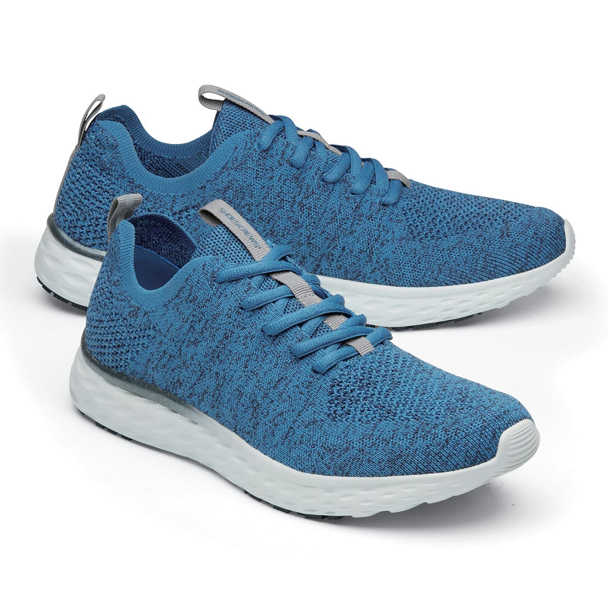 The Everlight Mens Ocean Blue from Shoes For Crews are slip-resistant, breathable, lightweight and easy-to-clean trainers, pair seen from the right side, emphasised on the tip of the right shoe.