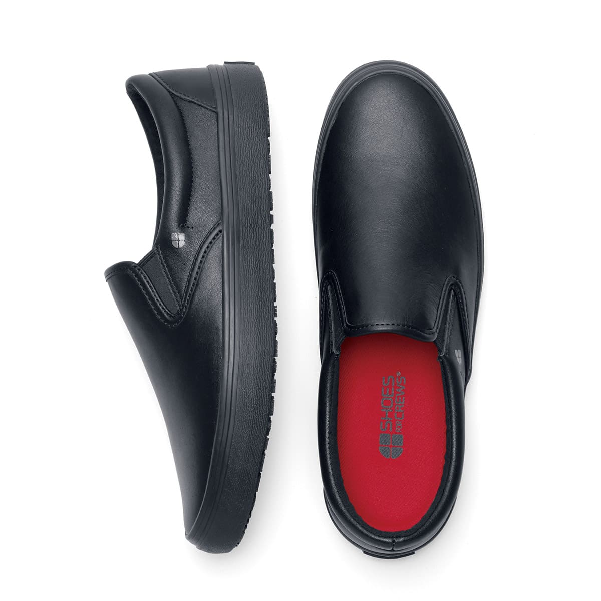 The Merlin Black from Shoes For Crews are slip-on slip resistant shoes with a lightweight design and constructed from genuine leather that has been specially treated to repel liquids from the surface, seen vertically from above and from the side.
