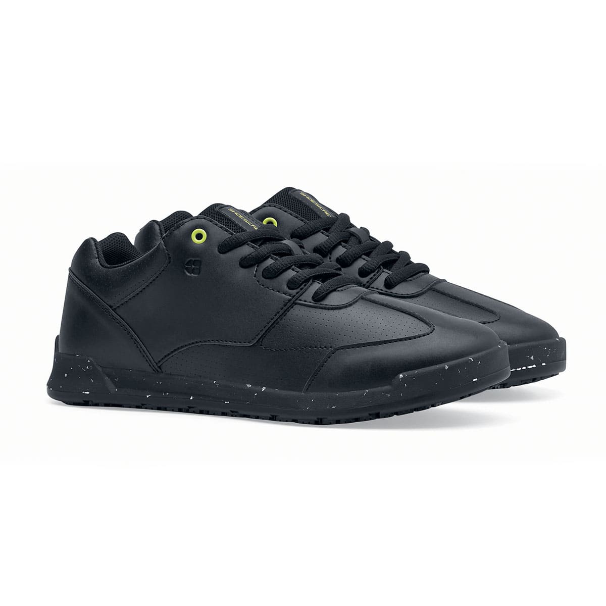 The Liberty Eco from Shoes For Crews are sustainable, slip-resistant trainers that provide comfort and safety throughout the day, pair seen in profile on the right.