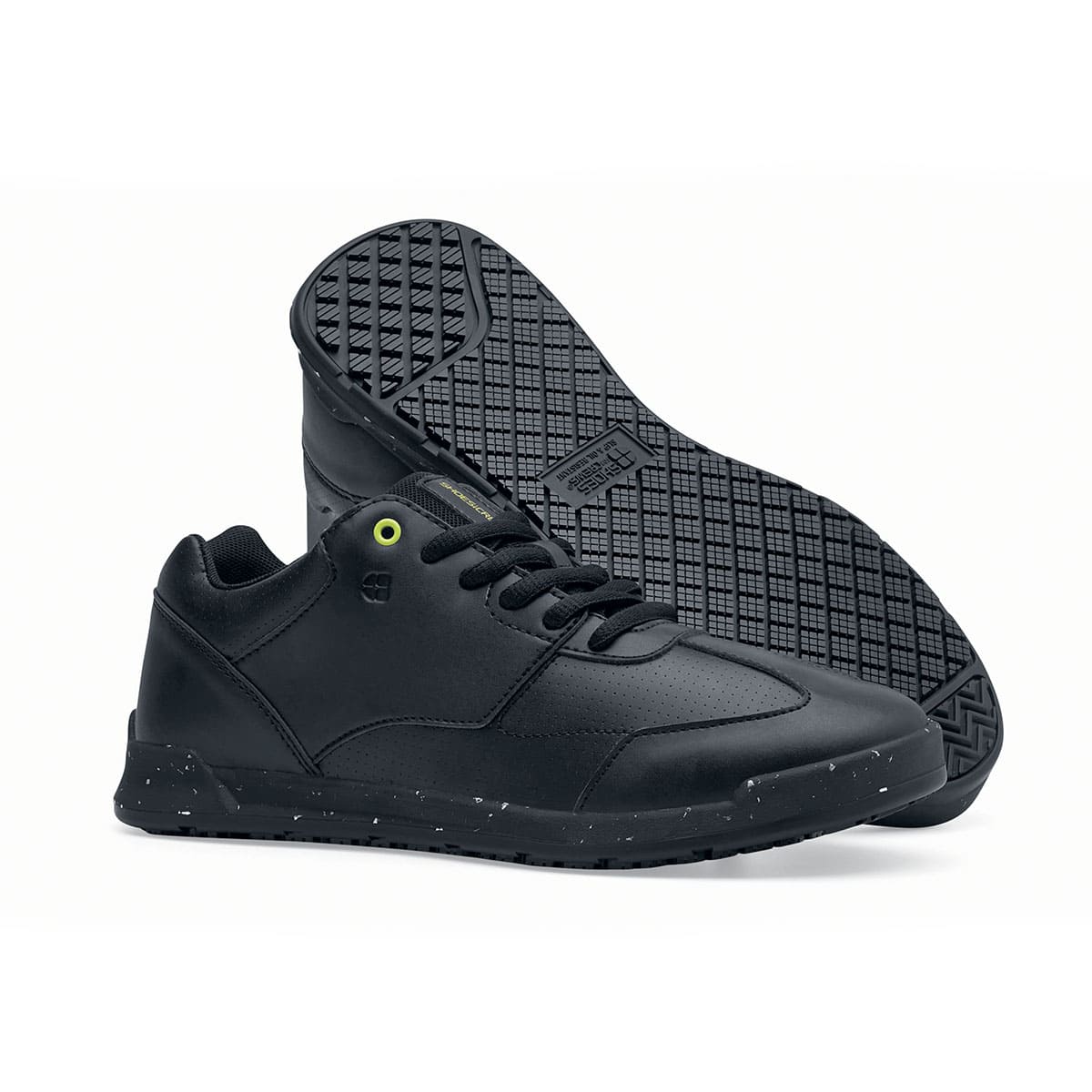 The Liberty Eco from Shoes For Crews are sustainable, slip-resistant trainers that provide comfort and safety throughout the day, pair seen from the right side and the sole.