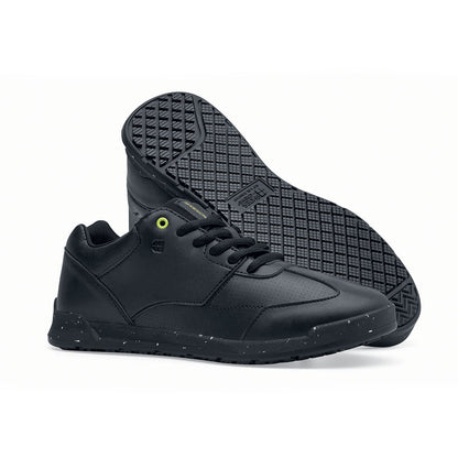 The Liberty Eco from Shoes For Crews are sustainable, slip-resistant trainers that provide comfort and safety throughout the day, pair seen from the right side and the sole.